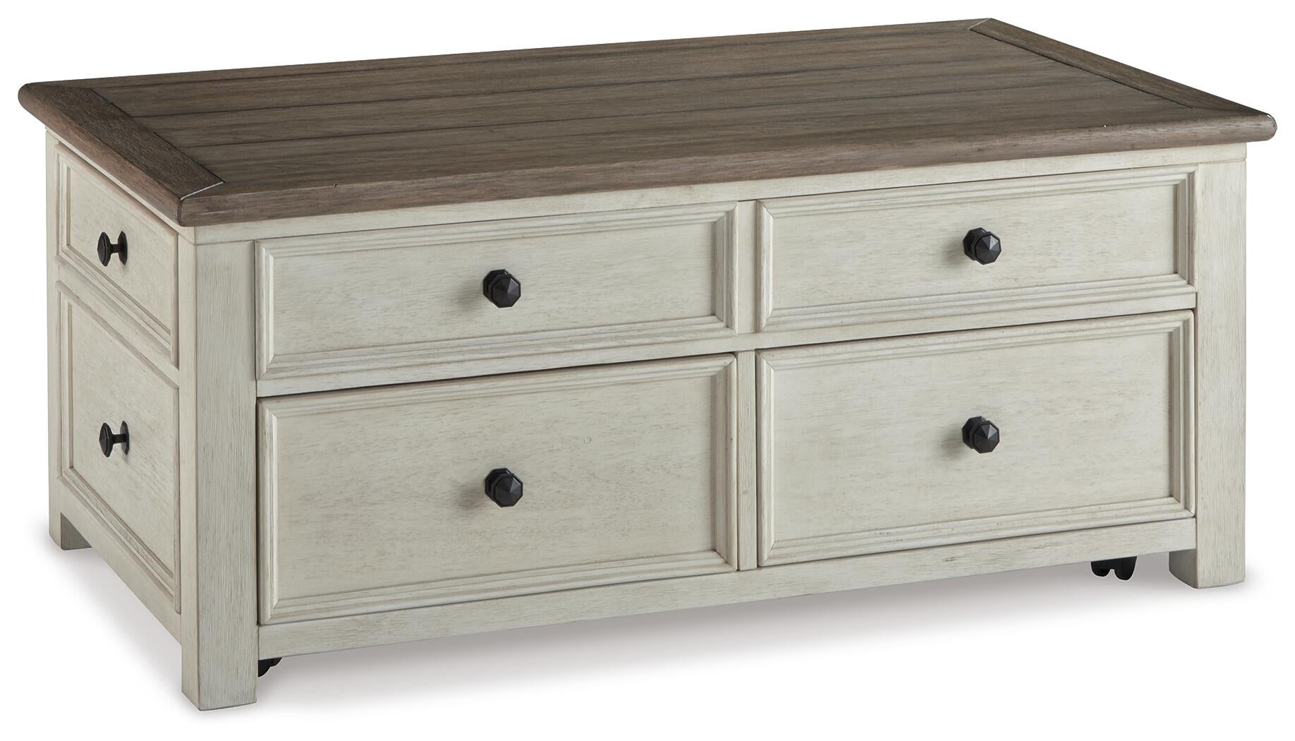The Bolanburg Lift Top Cocktail Table features a rectangular dark wood top, antique white finish base, and four front storage drawers with black knobs.