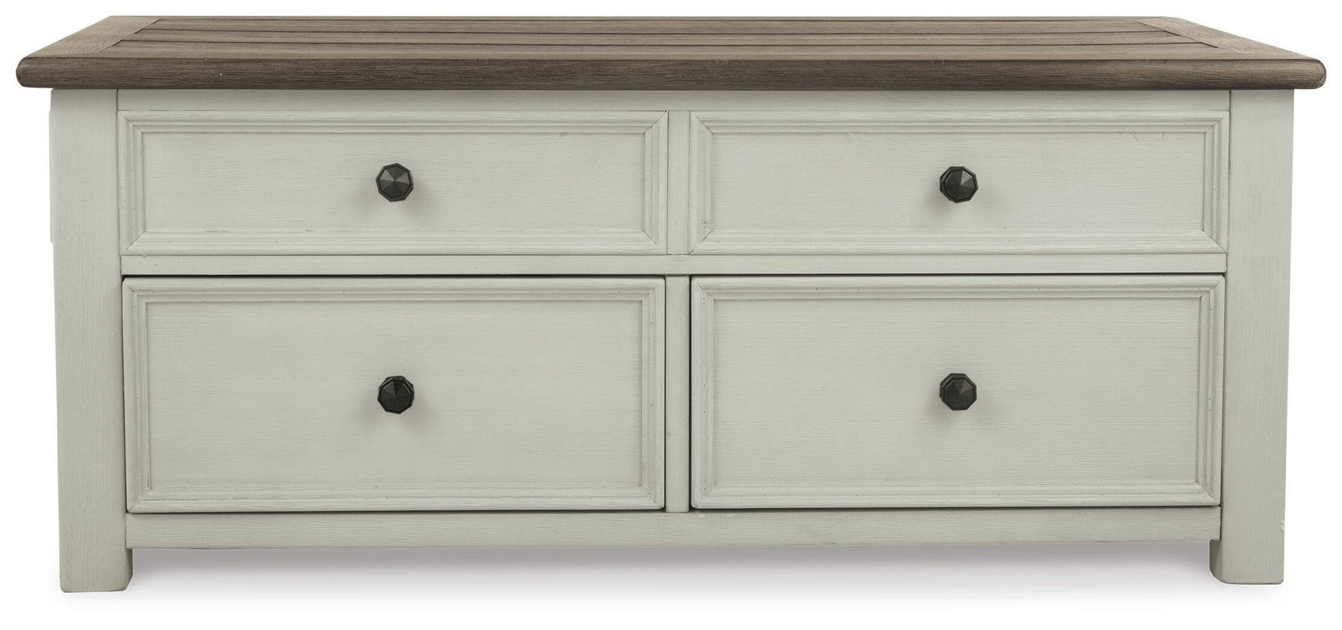 The Bolanburg Lift Top Cocktail Table features a dark wood top, four drawers with black round knobs, and an antique white body finish—offering both storage and charm to any room.