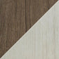 A diagonal split image shows dark brown wood grain on the upper left and light beige on the lower right, evoking the contrast featured in the Bolanburg Lift Top Cocktail Table's stylish design.