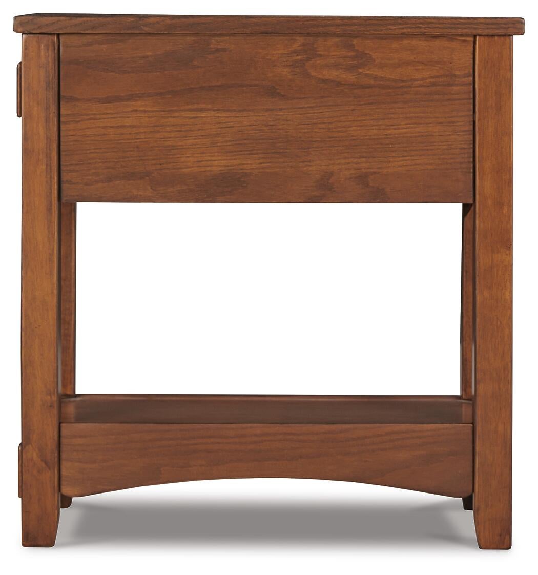 The Breegin Chair Side End Table features a flat top, solid side panels, and a bottom open shelf—perfect as a wooden nightstand or small storage table beside your bed.