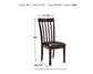 The Hammis Dining UPH Side Chair (2/CN) features a wooden rake back, cushioned seat, measures 40”H x 17.75”W x 20.75”D, weighs 18 lbs, and is made by Ashley Furniture Industries.