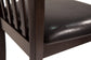 Close-up of the Hammis Dining UPH Side Chair (2/CN), featuring a contemporary design with a dark wood frame, black leather seat cushion, and vertical rake back slats, set against a white background.