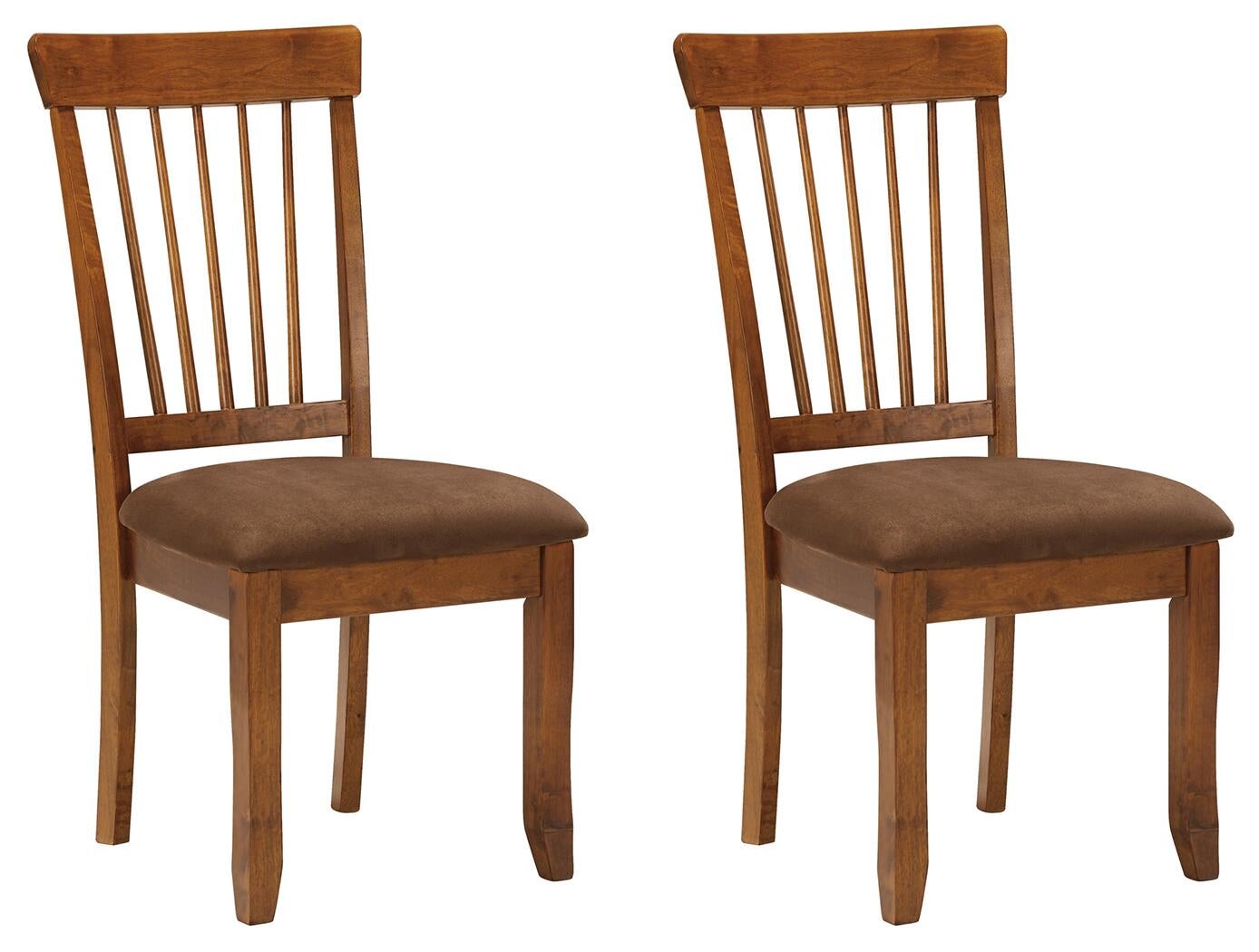 Two Berringer Dining UPH Side Chairs (2/CN) with cushioned brown microfiber seats and wooden spindle backs are placed side by side against a white background.