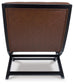 Back view of the Sidewinder Accent Chair featuring a brown faux leather cushion and a black wooden frame, set against a white background.