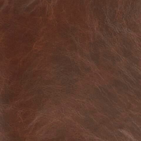 Close-up of brown faux leather with natural grain and subtle creases, perfect for the Sidewinder Accent Chair.