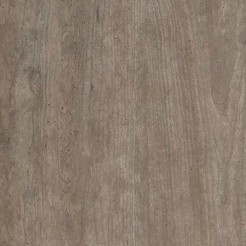 Close-up of the Culverbach Dresser and Mirror's brown wooden surface, featuring natural wood grain and a weathered driftwood finish, highlighting its subtle texture variations.