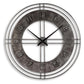 The Ana Sofia Wall Clock features an industrial metal frame, raised numbers, and black hour and minute hands that stylishly indicate 10:10.