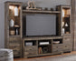 The Trinell 4-Piece Entertainment Center features a rustic wood finish, shelves, and cabinets for displaying decor, with space for a flat-screen TV in the center.