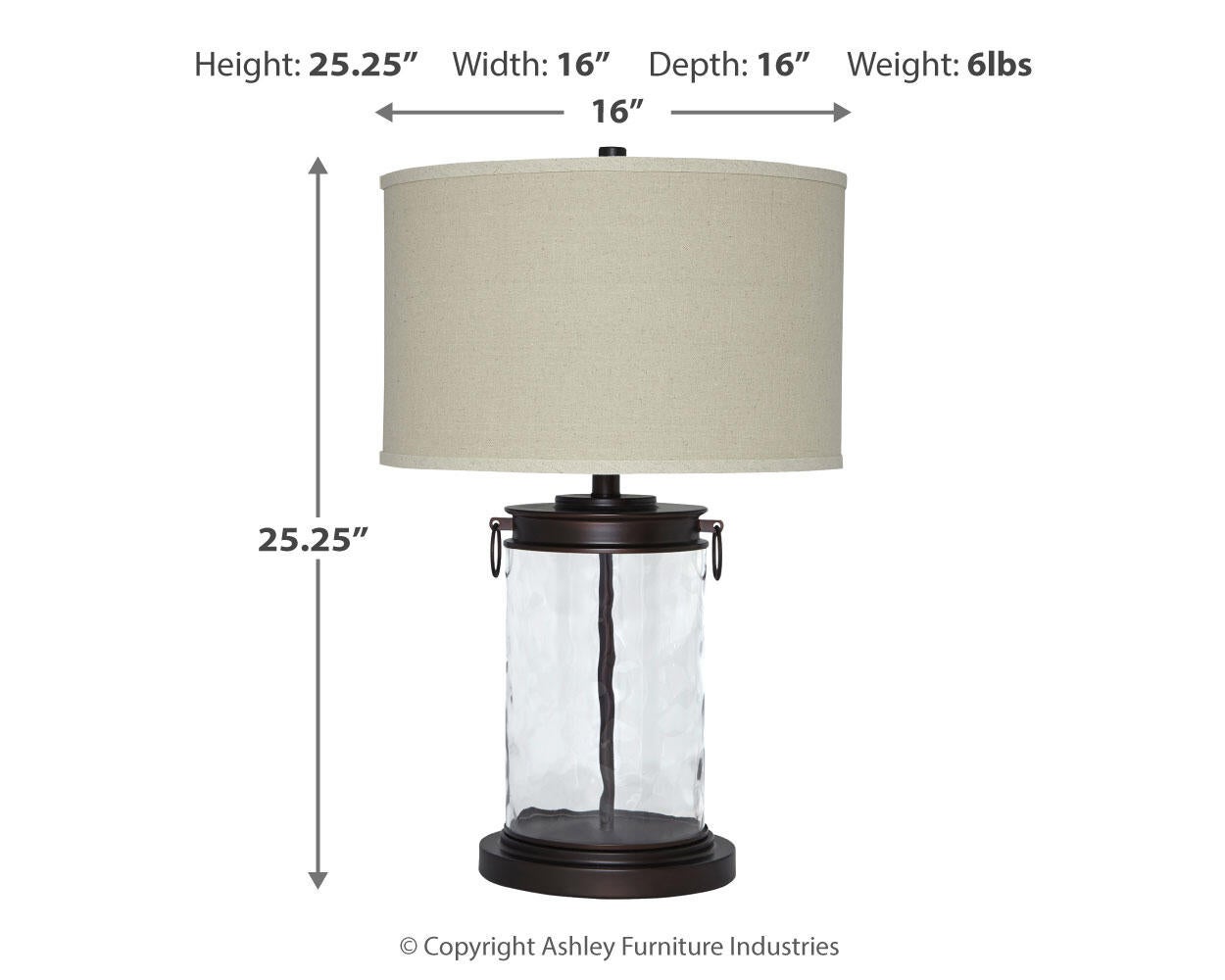 Tailynn Glass Table Lamp (1/CN) with a beige drum shade and clear textured glass base; 25.25"H x 16"W x 16"D, weighs 6 lbs.