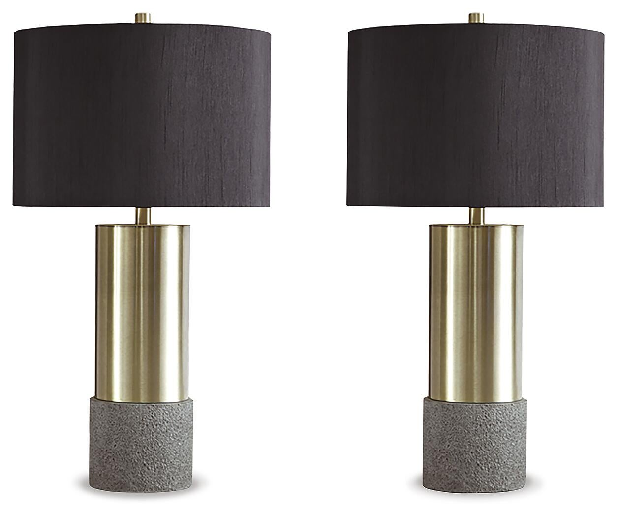 A pair of Jacek Metal Table Lamps featuring cylindrical brass-tone bases, textured faux concrete bottoms, and black drum shades are displayed side by side against a white background.