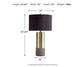 The Jacek Metal Table Lamp (2/CN) features a black drum shade, gold and stone base, measures 27.25" H x 15" W x 15" D, weighs 10 lbs. Measurements and arrows are shown.