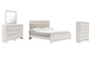 Altyra King Panel Bed with Mirrored Dresser and Chest at Walker Mattress and Furniture