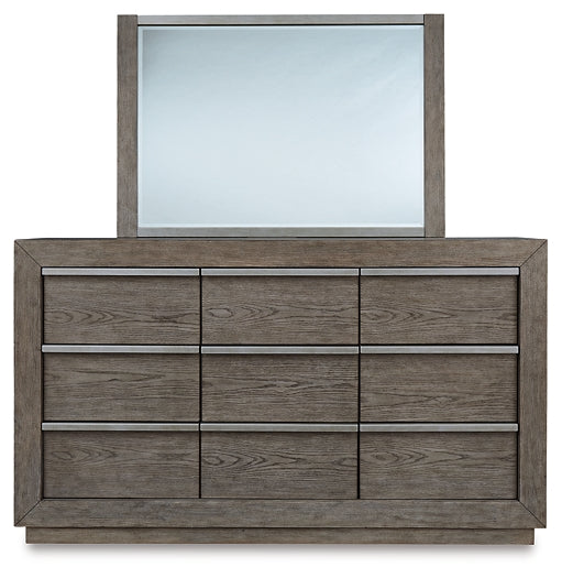 Anibecca California King Upholstered Bed with Mirrored Dresser, Chest and 2 Nightstands at Walker Mattress and Furniture
