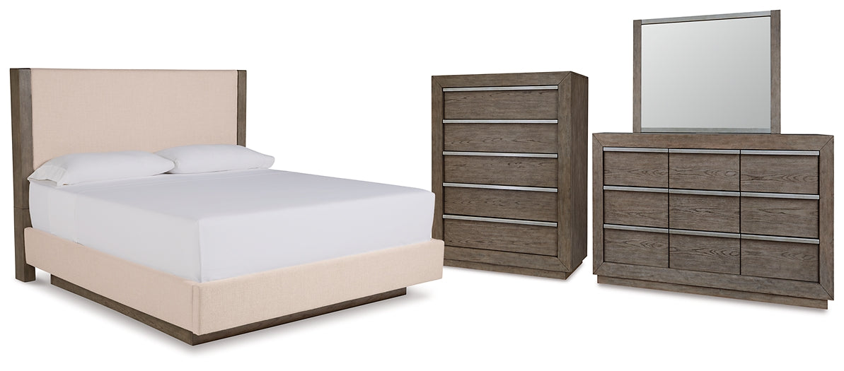 Anibecca Queen Upholstered Panel Bed with Mirrored Dresser and Chest at Walker Mattress and Furniture