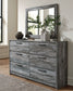 Baystorm Queen Panel Bed with 2 Storage Drawers with Mirrored Dresser and Nightstand at Walker Mattress and Furniture