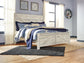 Bellaby Queen Crossbuck Panel Bed with Mirrored Dresser at Walker Mattress and Furniture Locations in Cedar Park and Belton TX.
