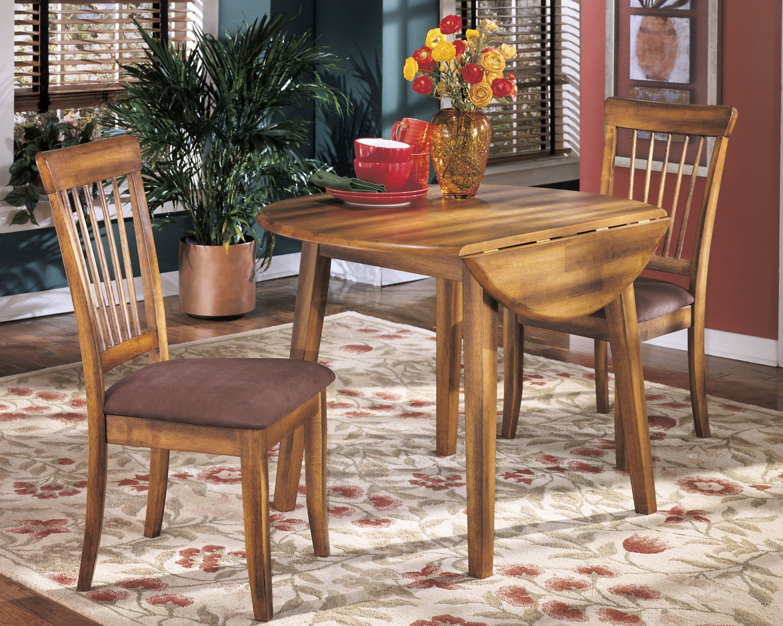 Berringer Round DRM Drop Leaf Table at Walker Mattress and Furniture Locations in Cedar Park and Belton TX.