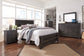 Brinxton Queen Panel Bed with Mirrored Dresser and 2 Nightstands at Walker Mattress and Furniture Locations in Cedar Park and Belton TX.