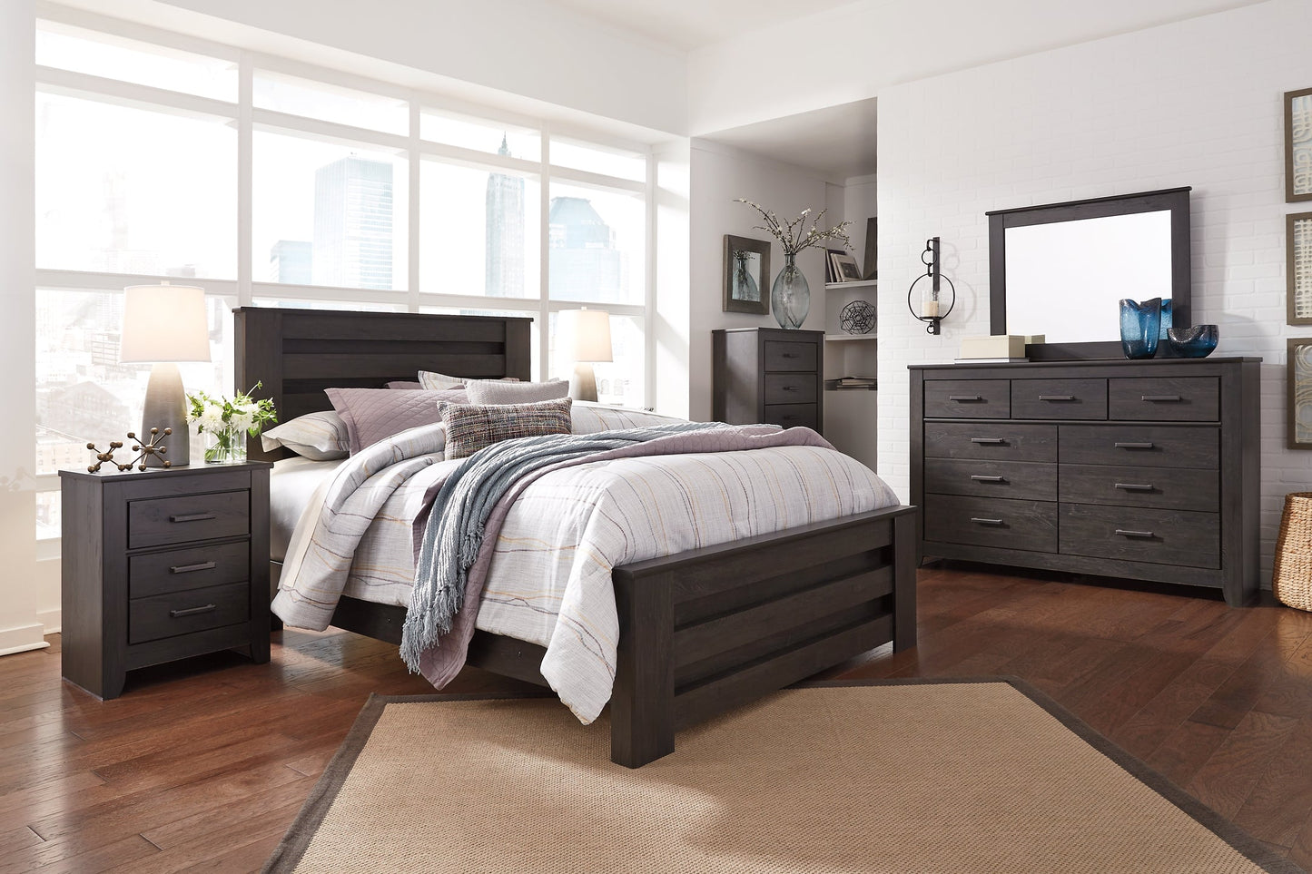 Brinxton Queen Panel Bed with Mirrored Dresser and Chest at Walker Mattress and Furniture Locations in Cedar Park and Belton TX.