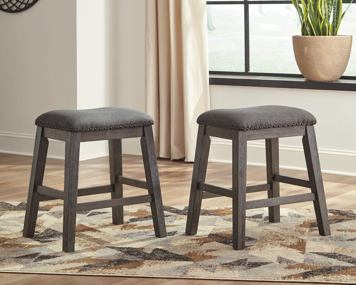 Caitbrook Upholstered Stool (2/CN) at Walker Mattress and Furniture Locations in Cedar Park and Belton TX.