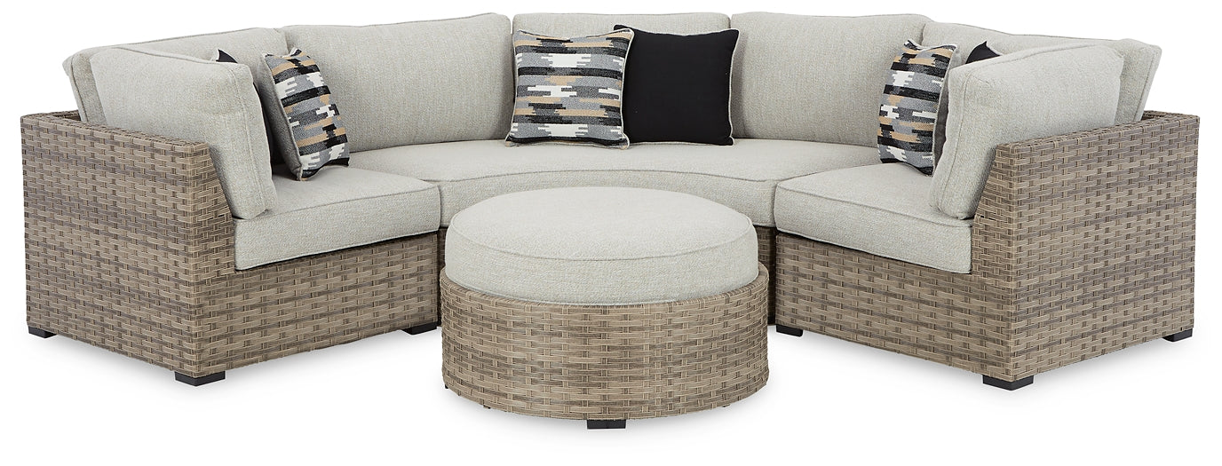 Calworth 5-Piece Outdoor Sectional with Ottoman at Walker Mattress and Furniture Locations in Cedar Park and Belton TX.