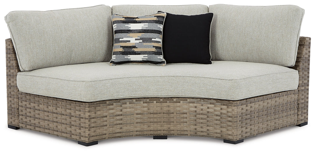 Calworth Outdoor 9-Piece Sectional with Ottoman at Walker Mattress and Furniture Locations in Cedar Park and Belton TX.