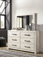 Cambeck Queen Panel Bed with 4 Storage Drawers with Mirrored Dresser, Chest and 2 Nightstands at Walker Mattress and Furniture Locations in Cedar Park and Belton TX.