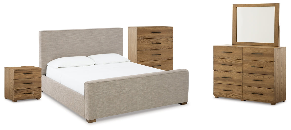 Dakmore King Upholstered Bed with Mirrored Dresser, Chest and Nightstand at Walker Mattress and Furniture Locations in Cedar Park and Belton TX.
