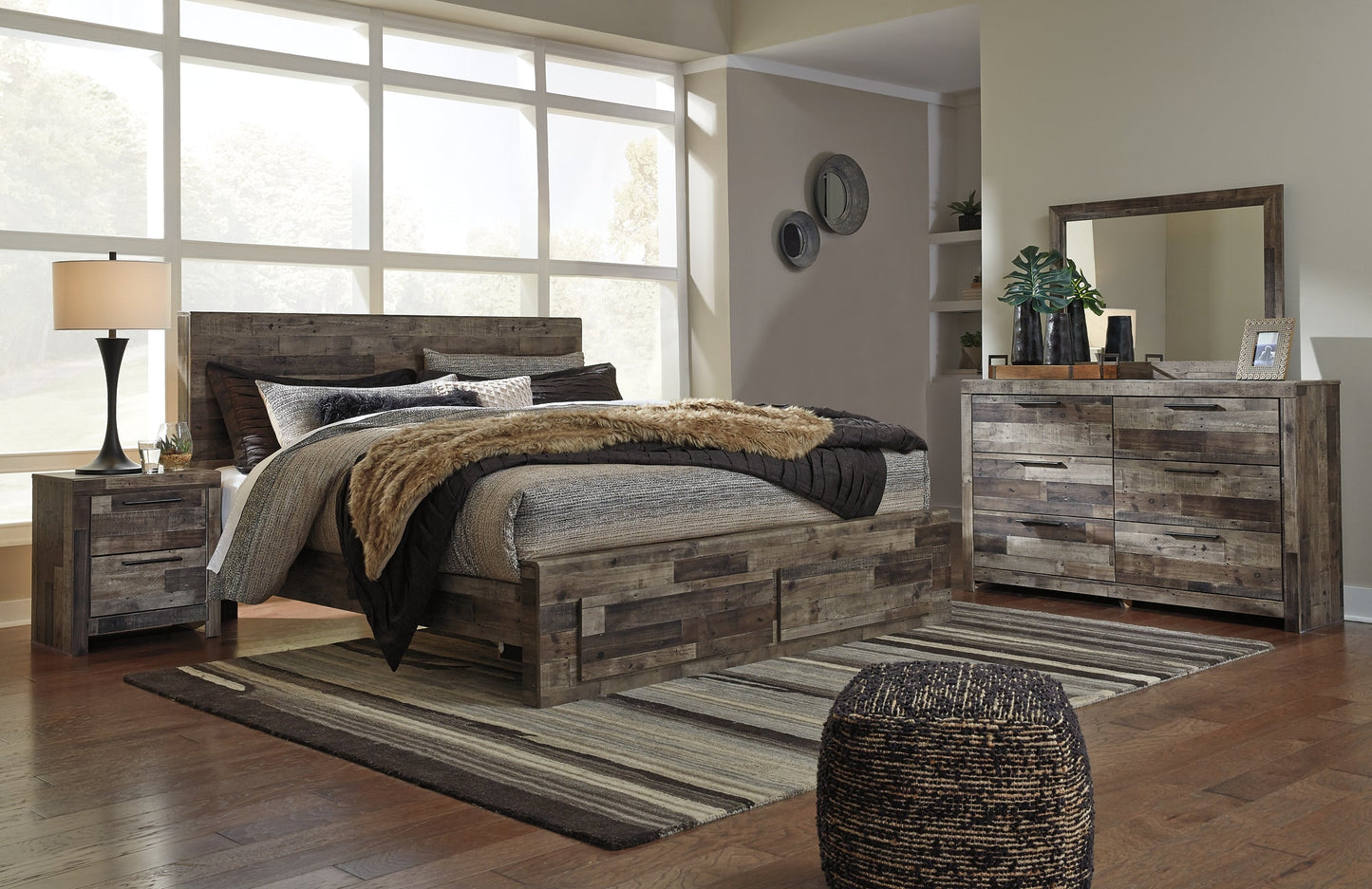 Derekson King Panel Bed with 2 Storage Drawers with Mirrored Dresser and Nightstand at Walker Mattress and Furniture Locations in Cedar Park and Belton TX.