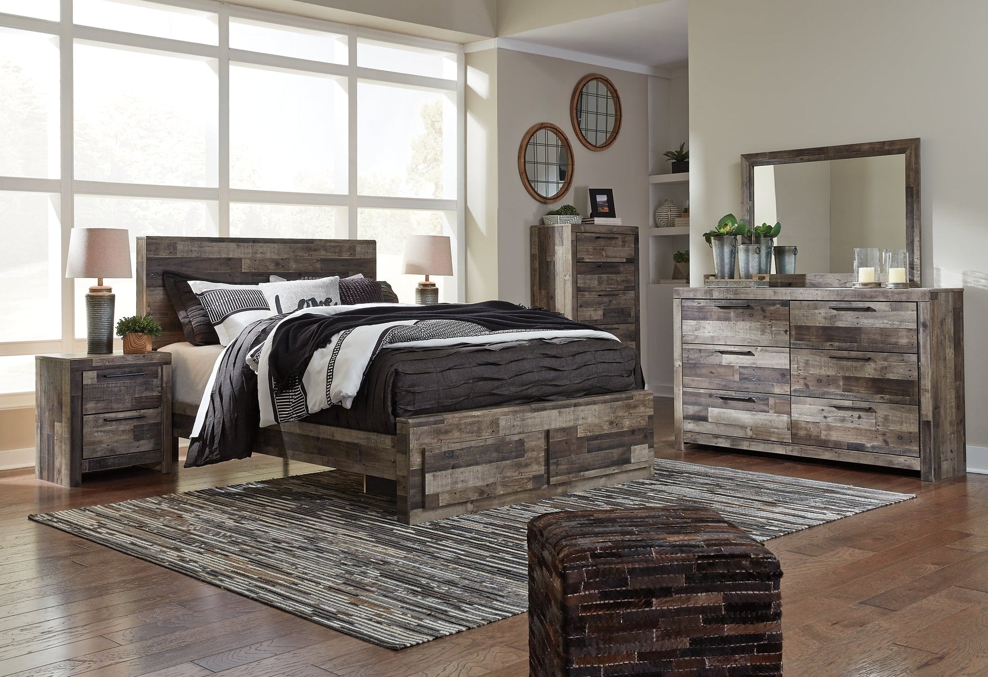Derekson Queen Panel Bed with 2 Storage Drawers with Mirrored Dresser, Chest and 2 Nightstands at Walker Mattress and Furniture Locations in Cedar Park and Belton TX.