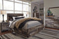 Derekson Queen Panel Bed with 4 Storage Drawers at Walker Mattress and Furniture Locations in Cedar Park and Belton TX.