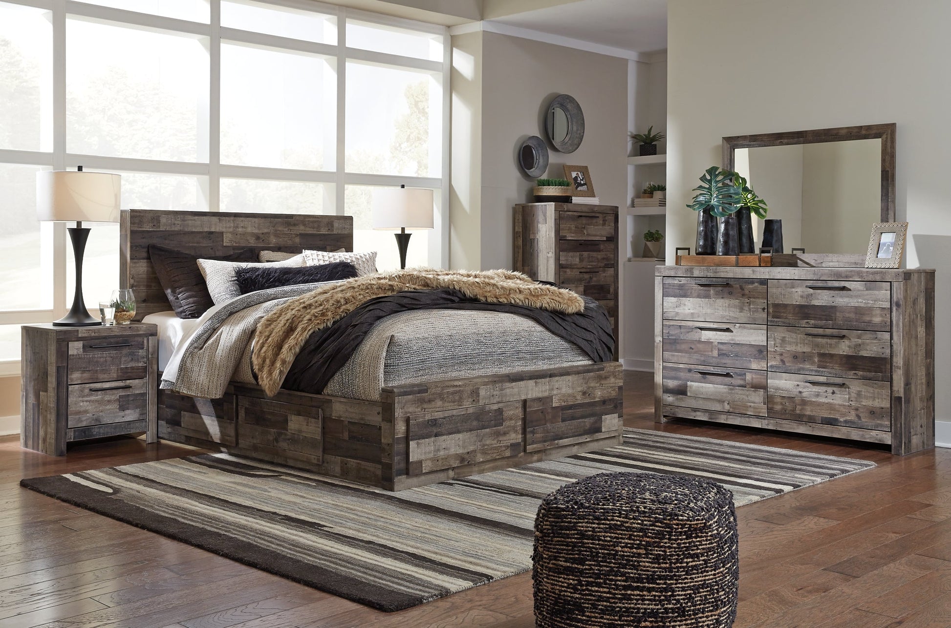 Derekson Queen Panel Bed with 4 Storage Drawers with Mirrored Dresser, Chest and Nightstand at Walker Mattress and Furniture Locations in Cedar Park and Belton TX.