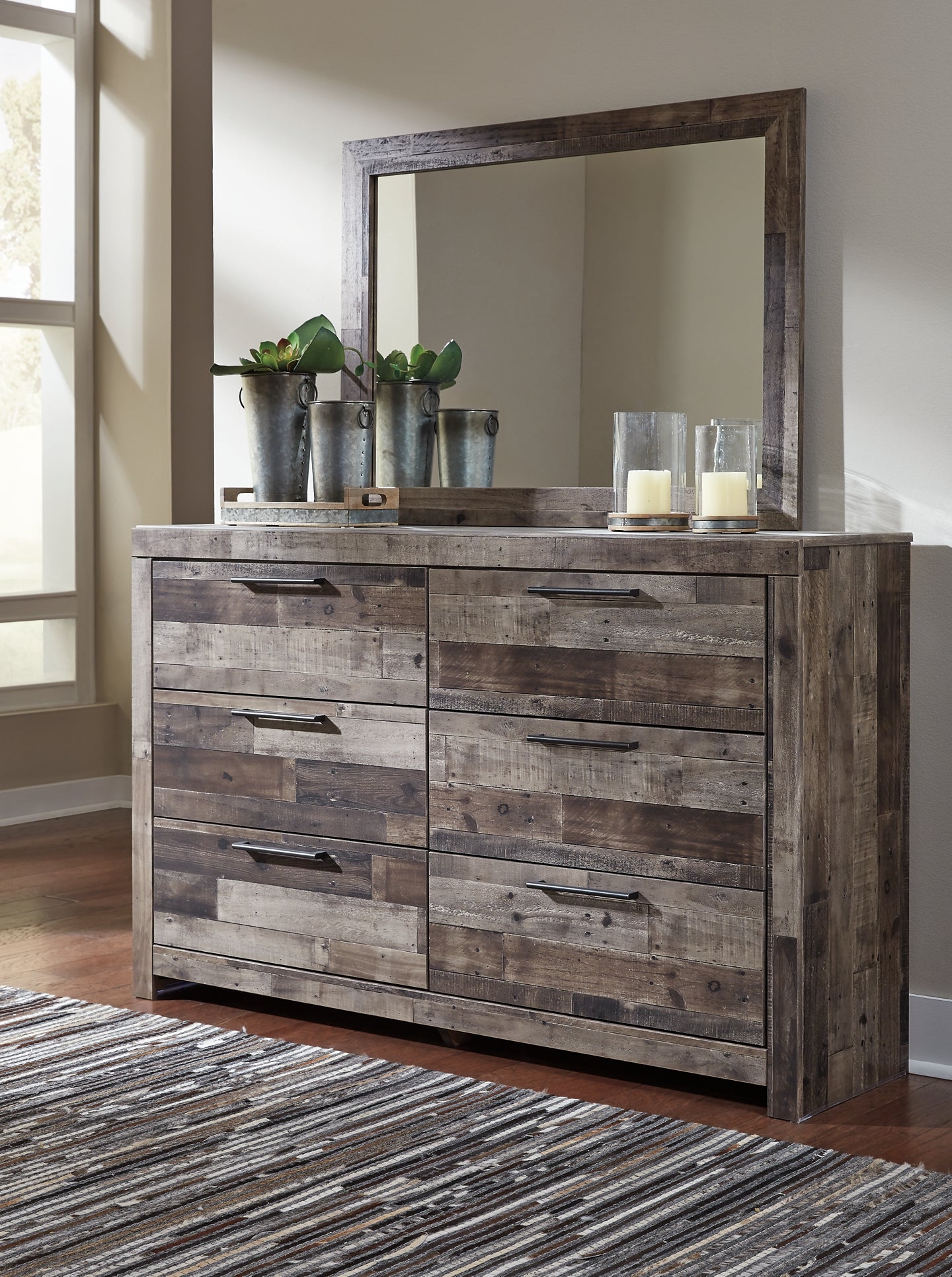 Derekson Queen Panel Bed with 6 Storage Drawers with Mirrored Dresser and Chest at Walker Mattress and Furniture Locations in Cedar Park and Belton TX.