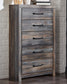 Drystan Five Drawer Chest at Walker Mattress and Furniture Locations in Cedar Park and Belton TX.