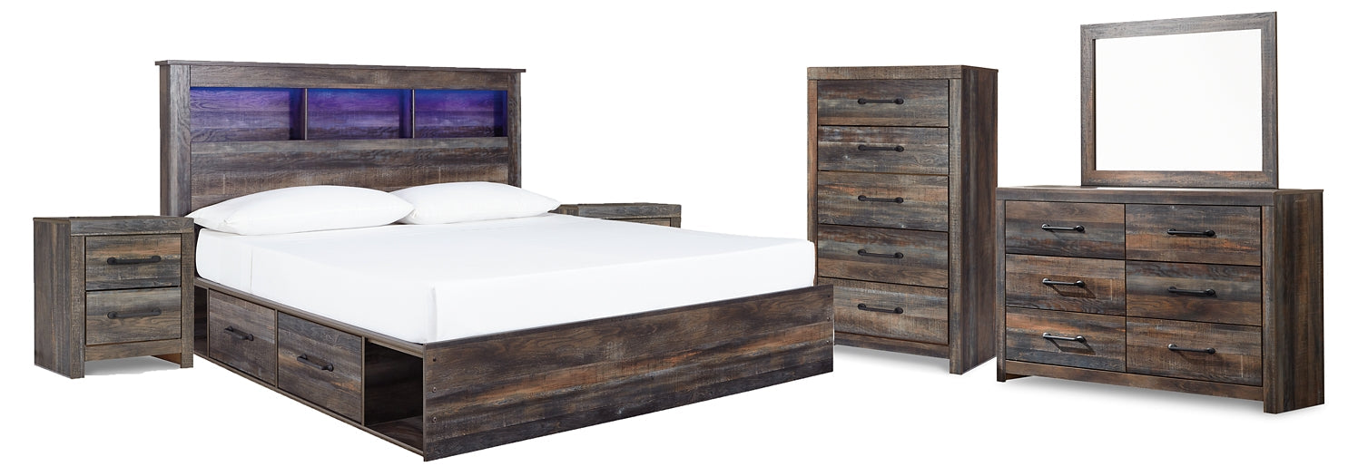Drystan King Bookcase Bed with 4 Storage Drawers with Mirrored Dresser, Chest and 2 Nightstands at Walker Mattress and Furniture Locations in Cedar Park and Belton TX.