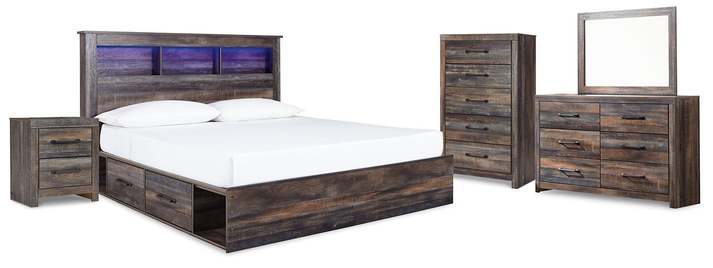 Drystan King Bookcase Bed with 4 Storage Drawers with Mirrored Dresser and 2 Nightstands at Walker Mattress and Furniture Locations in Cedar Park and Belton TX.