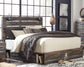 Drystan King Panel Bed with 2 Storage Drawers with Mirrored Dresser, Chest and Nightstand at Walker Mattress and Furniture Locations in Cedar Park and Belton TX.