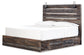 Drystan King Panel Bed with 4 Storage Drawers with Dresser at Walker Mattress and Furniture Locations in Cedar Park and Belton TX.