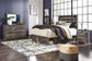 Drystan King Panel Bed with 4 Storage Drawers with Mirrored Dresser and Chest at Walker Mattress and Furniture Locations in Cedar Park and Belton TX.
