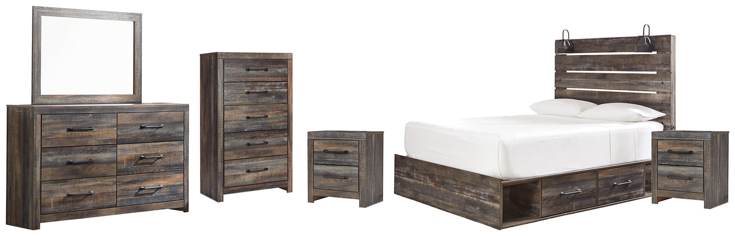 Drystan King Panel Bed with Mirrored Dresser, Chest and 2 Nightstands at Walker Mattress and Furniture Locations in Cedar Park and Belton TX.