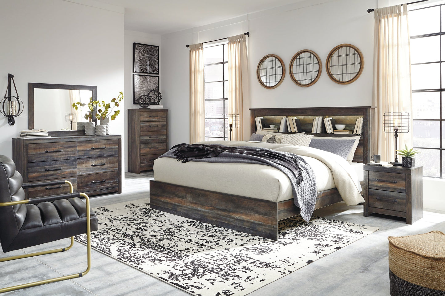 Drystan King Panel Bookcase Bed with Mirrored Dresser, Chest and 2 Nightstands at Walker Mattress and Furniture Locations in Cedar Park and Belton TX.