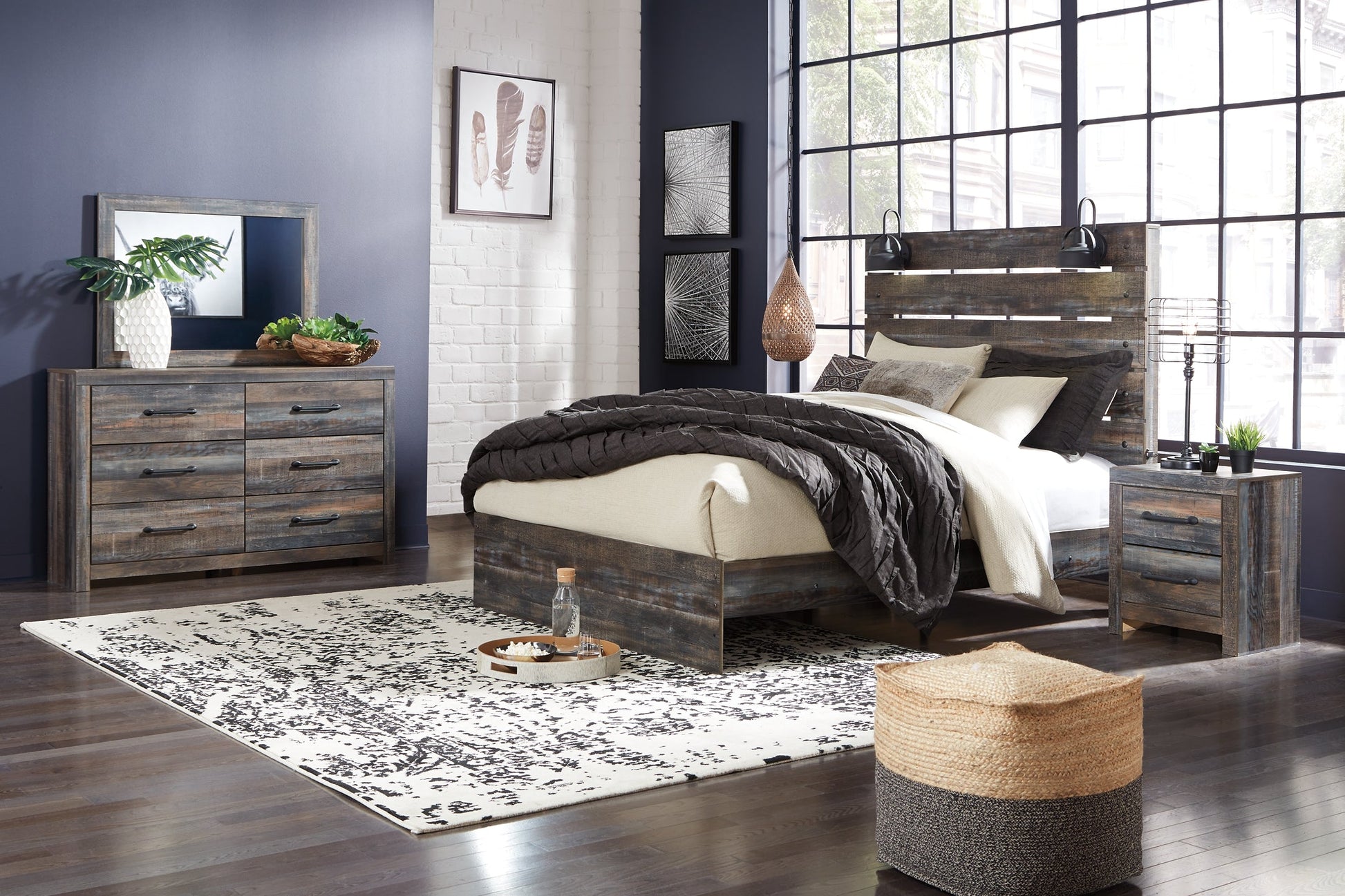 Drystan Queen Panel Bed with Mirrored Dresser at Walker Mattress and Furniture Locations in Cedar Park and Belton TX.