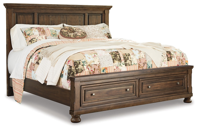 Flynnter Queen Panel Bed with 2 Storage Drawers with Mirrored Dresser, Chest and Nightstand at Walker Mattress and Furniture Locations in Cedar Park and Belton TX.