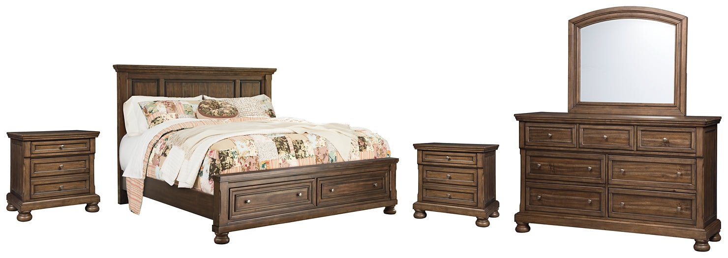 Flynnter Queen Panel Bed with 2 Storage Drawers with Mirrored Dresser and 2 Nightstands at Walker Mattress and Furniture Locations in Cedar Park and Belton TX.
