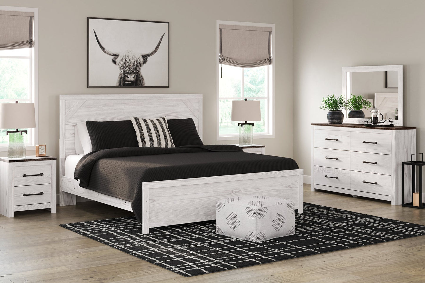 Gerridan King Panel Bed with Mirrored Dresser and Nightstand at Walker Mattress and Furniture Locations in Cedar Park and Belton TX.