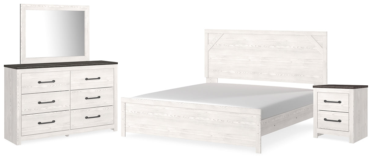 Gerridan King Panel Bed with Mirrored Dresser and Nightstand at Walker Mattress and Furniture Locations in Cedar Park and Belton TX.