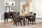 Haddigan Dining Table and 4 Chairs with Storage at Walker Mattress and Furniture Locations in Cedar Park and Belton TX.