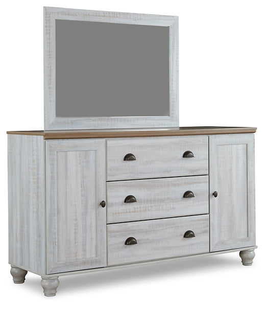Haven Bay King Panel Bed with Mirrored Dresser and Chest at Walker Mattress and Furniture Locations in Cedar Park and Belton TX.