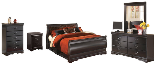 Huey Vineyard Queen Sleigh Bed with Mirrored Dresser, Chest and Nightstand at Walker Mattress and Furniture Locations in Cedar Park and Belton TX.