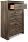 Juararo Five Drawer Chest at Walker Mattress and Furniture Locations in Cedar Park and Belton TX.